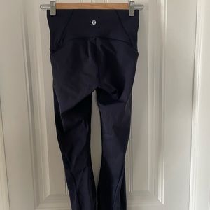 Lululemon high rise 25” tight with mesh detail. Plum